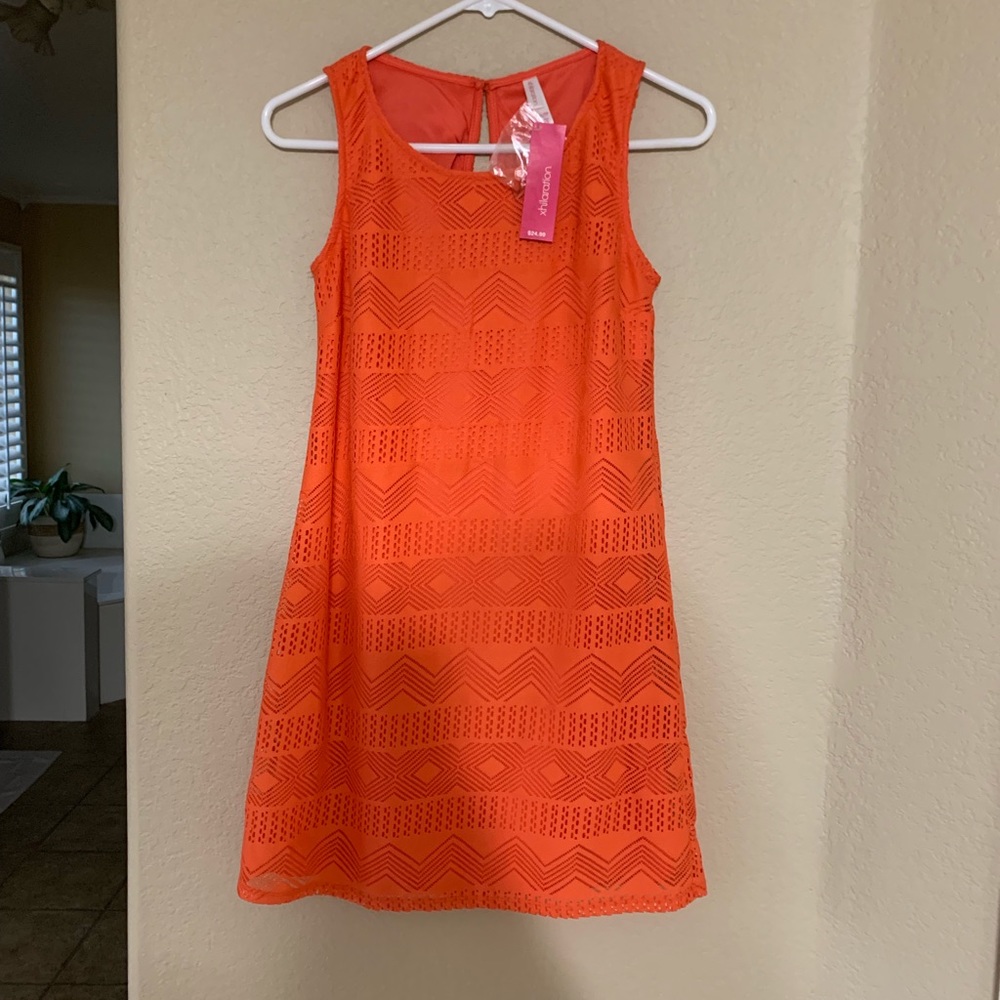 NWT. Orange/salmon colored sleeveless dress